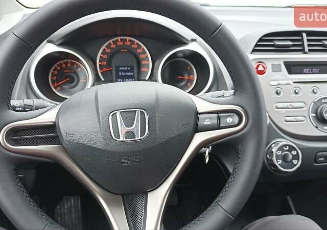 Красный Хонда Джаз, объемом двигателя 1.2 л и пробегом 146 тыс. км за 6800 $, фото 10 на Automoto.ua