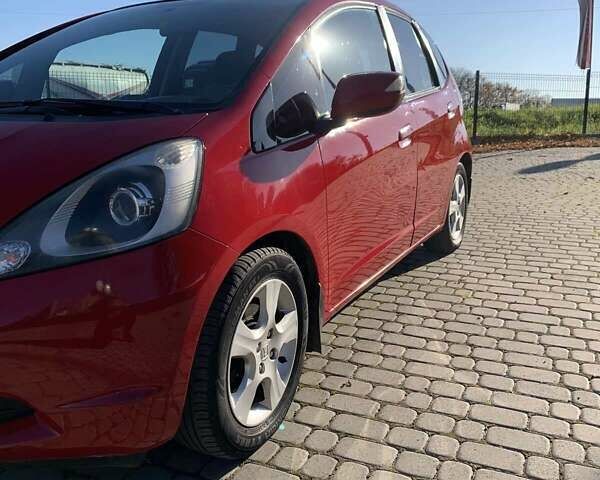 Червоний Хонда Джаз, об'ємом двигуна 1.34 л та пробігом 162 тис. км за 5750 $, фото 12 на Automoto.ua