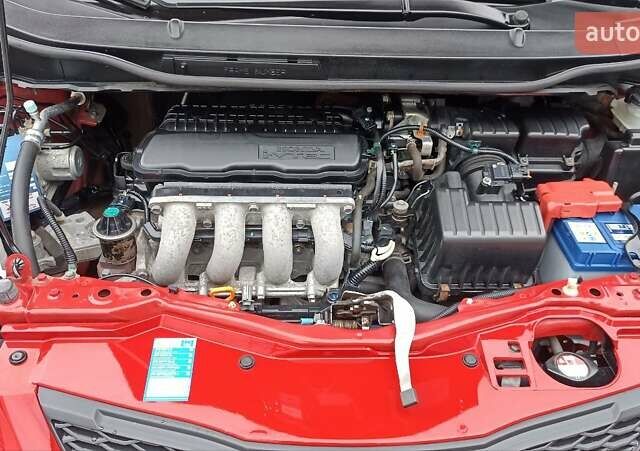 Красный Хонда Джаз, объемом двигателя 1.2 л и пробегом 146 тыс. км за 6800 $, фото 15 на Automoto.ua