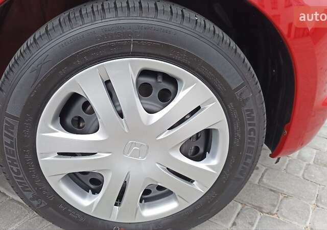 Красный Хонда Джаз, объемом двигателя 1.2 л и пробегом 146 тыс. км за 6800 $, фото 14 на Automoto.ua