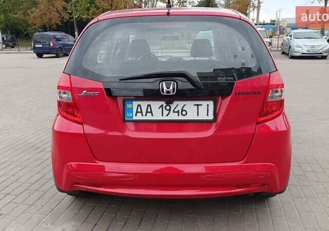Красный Хонда Джаз, объемом двигателя 1.3 л и пробегом 154 тыс. км за 7300 $, фото 1 на Automoto.ua