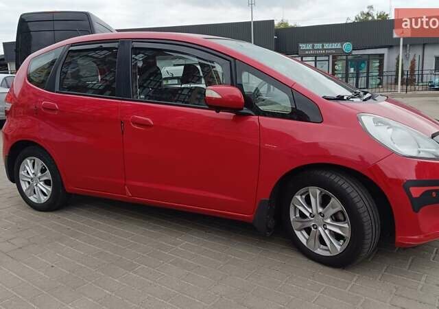 Красный Хонда Джаз, объемом двигателя 1.3 л и пробегом 154 тыс. км за 7300 $, фото 5 на Automoto.ua