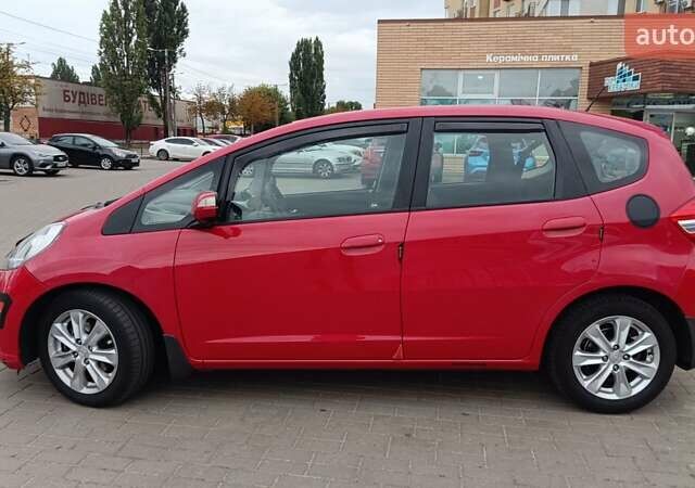 Красный Хонда Джаз, объемом двигателя 1.3 л и пробегом 154 тыс. км за 7300 $, фото 2 на Automoto.ua