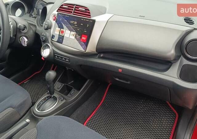 Красный Хонда Джаз, объемом двигателя 1.3 л и пробегом 154 тыс. км за 7300 $, фото 16 на Automoto.ua
