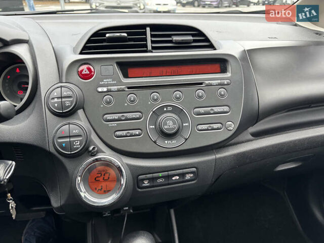 Красный Хонда Джаз, объемом двигателя 1.34 л и пробегом 107 тыс. км за 9500 $, фото 22 на Automoto.ua