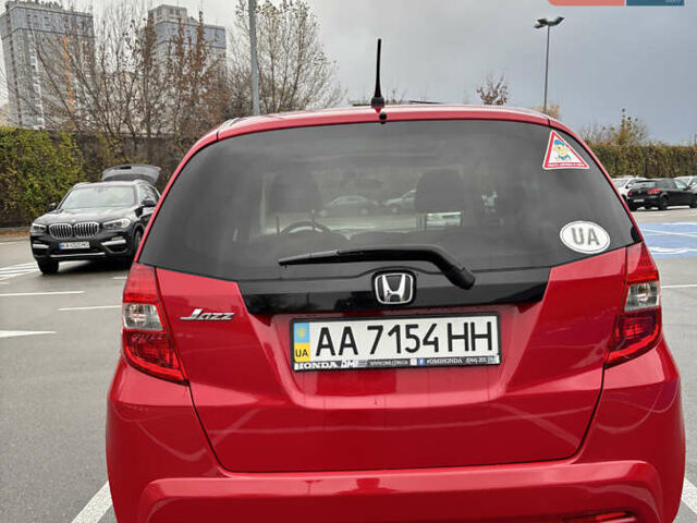 Красный Хонда Джаз, объемом двигателя 1.34 л и пробегом 107 тыс. км за 9500 $, фото 5 на Automoto.ua
