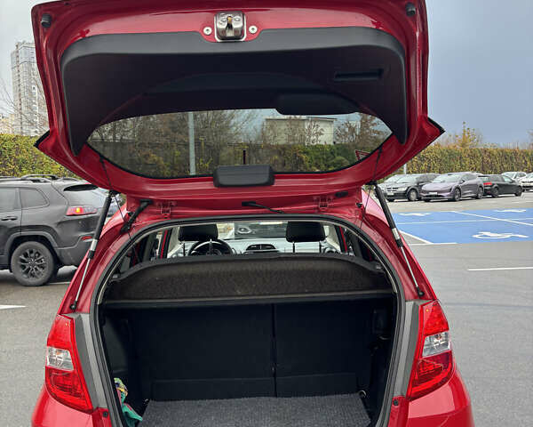 Красный Хонда Джаз, объемом двигателя 1.34 л и пробегом 107 тыс. км за 9500 $, фото 17 на Automoto.ua