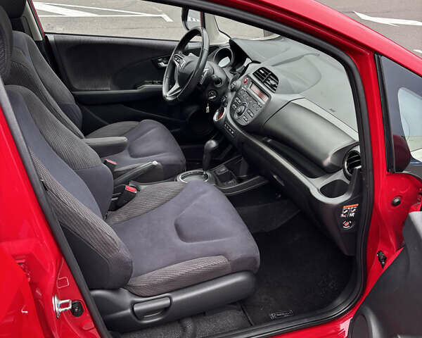 Красный Хонда Джаз, объемом двигателя 1.34 л и пробегом 107 тыс. км за 9500 $, фото 12 на Automoto.ua