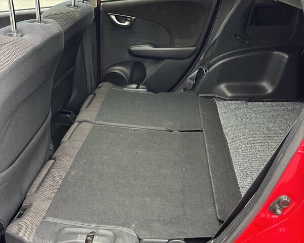 Красный Хонда Джаз, объемом двигателя 1.34 л и пробегом 107 тыс. км за 9500 $, фото 18 на Automoto.ua