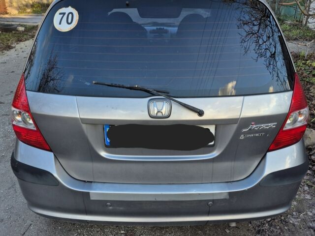 Серый Хонда Джаз, объемом двигателя 1.4 л и пробегом 208 тыс. км за 4500 $, фото 2 на Automoto.ua