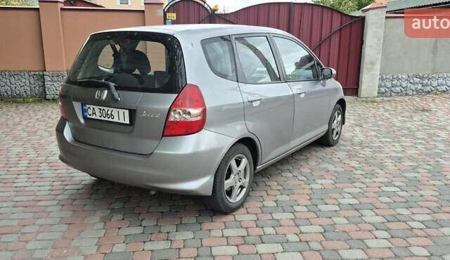 Серый Хонда Джаз, объемом двигателя 1.3 л и пробегом 150 тыс. км за 4400 $, фото 3 на Automoto.ua