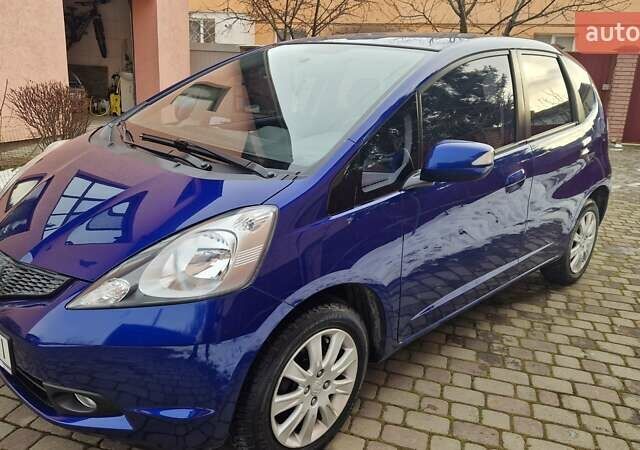 Синий Хонда Джаз, объемом двигателя 1.34 л и пробегом 188 тыс. км за 7300 $, фото 24 на Automoto.ua