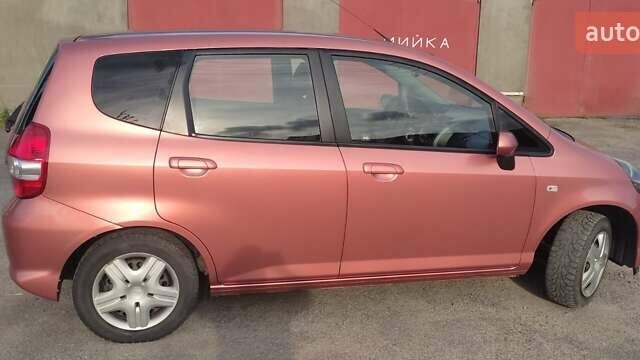 Помаранчевий Хонда Джаз, об'ємом двигуна 1.2 л та пробігом 314 тис. км за 4400 $, фото 7 на Automoto.ua