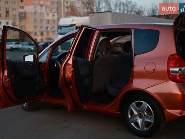 Помаранчевий Хонда Джаз, об'ємом двигуна 1.4 л та пробігом 169 тис. км за 5800 $, фото 4 на Automoto.ua