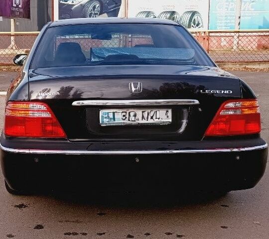 Черный Хонда Легенд, объемом двигателя 3.5 л и пробегом 320 тыс. км за 3500 $, фото 1 на Automoto.ua