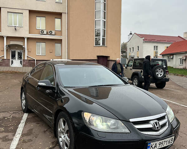 Черный Хонда Легенд, объемом двигателя 3.47 л и пробегом 335 тыс. км за 5500 $, фото 1 на Automoto.ua