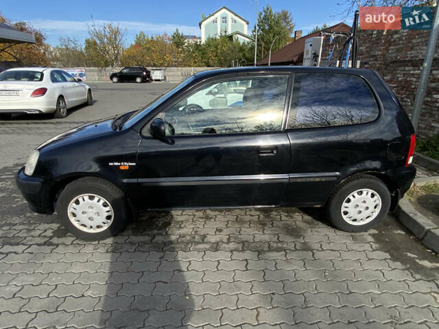 Чорний Хонда Лого, об'ємом двигуна 1.34 л та пробігом 195 тис. км за 3400 $, фото 2 на Automoto.ua