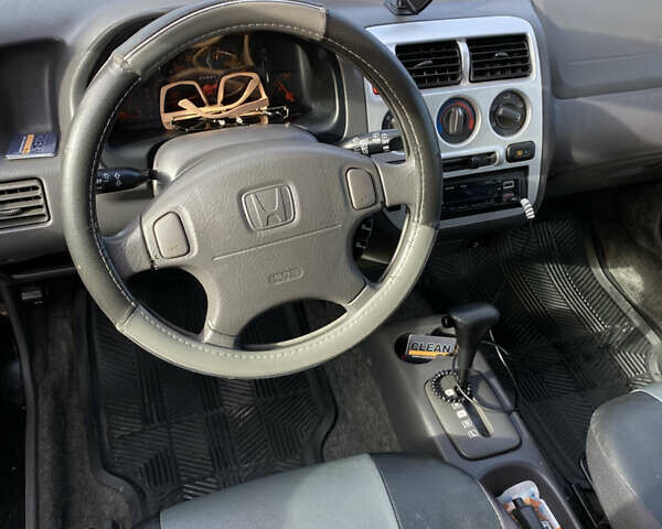 Чорний Хонда Лого, об'ємом двигуна 1.34 л та пробігом 195 тис. км за 3400 $, фото 11 на Automoto.ua