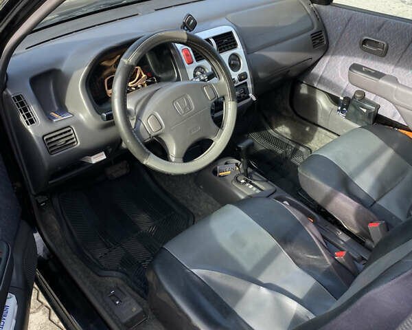 Чорний Хонда Лого, об'ємом двигуна 1.34 л та пробігом 195 тис. км за 3400 $, фото 12 на Automoto.ua