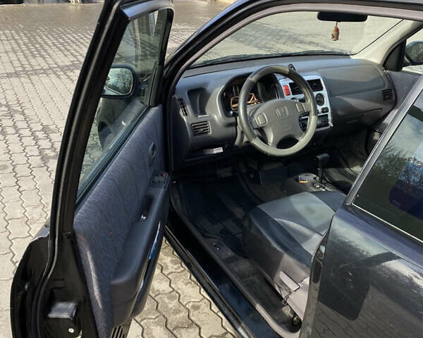 Чорний Хонда Лого, об'ємом двигуна 1.34 л та пробігом 195 тис. км за 3400 $, фото 13 на Automoto.ua