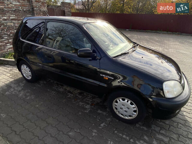 Чорний Хонда Лого, об'ємом двигуна 1.34 л та пробігом 195 тис. км за 3400 $, фото 1 на Automoto.ua