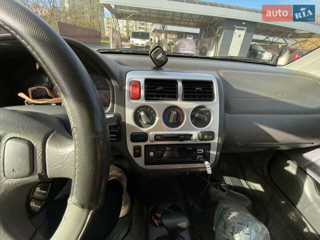 Чорний Хонда Лого, об'ємом двигуна 1.34 л та пробігом 195 тис. км за 3400 $, фото 20 на Automoto.ua