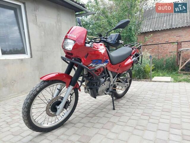 Красный Хонда NX 650 Dominator, объемом двигателя 0.64 л и пробегом 39 тыс. км за 3200 $, фото 2 на Automoto.ua