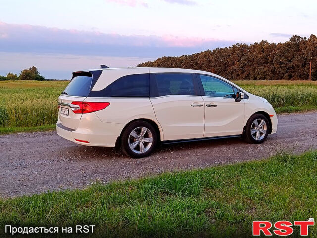 Белый Хонда Одиссей, объемом двигателя 3.5 л и пробегом 86 тыс. км за 24500 $, фото 4 на Automoto.ua