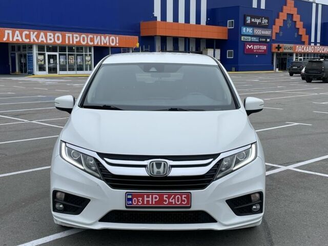 Белый Хонда Одиссей, объемом двигателя 3.5 л и пробегом 99 тыс. км за 18500 $, фото 1 на Automoto.ua