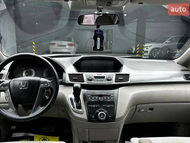 Черный Хонда Одиссей, объемом двигателя 3.47 л и пробегом 314 тыс. км за 12000 $, фото 7 на Automoto.ua