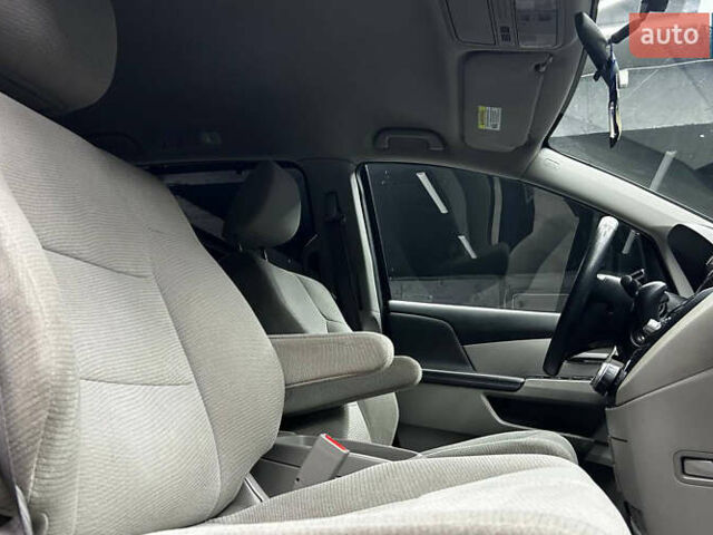 Черный Хонда Одиссей, объемом двигателя 3.47 л и пробегом 314 тыс. км за 12000 $, фото 16 на Automoto.ua