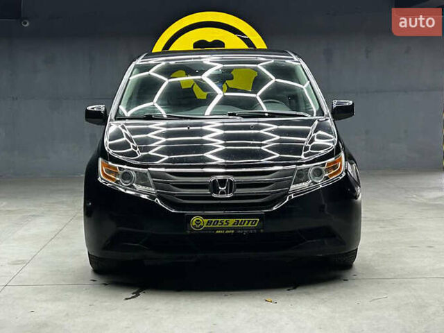 Черный Хонда Одиссей, объемом двигателя 3.47 л и пробегом 314 тыс. км за 12000 $, фото 1 на Automoto.ua