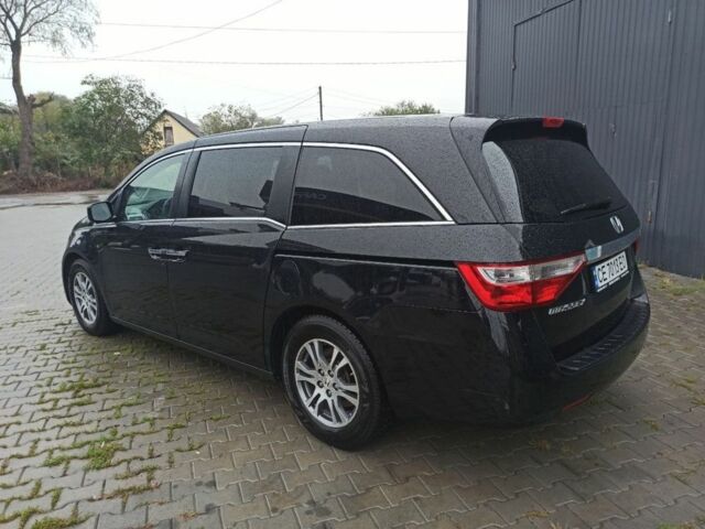 Черный Хонда Одиссей, объемом двигателя 3.5 л и пробегом 290 тыс. км за 11500 $, фото 4 на Automoto.ua