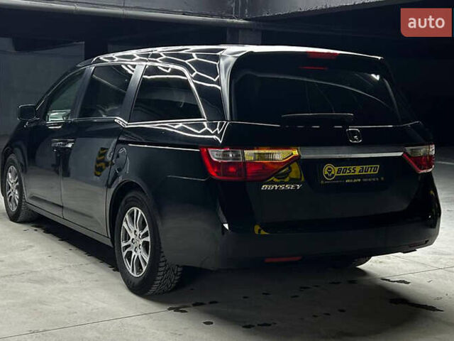 Черный Хонда Одиссей, объемом двигателя 3.47 л и пробегом 314 тыс. км за 12000 $, фото 3 на Automoto.ua