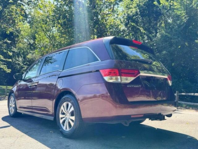 Красный Хонда Одиссей, объемом двигателя 3.5 л и пробегом 68 тыс. км за 22000 $, фото 3 на Automoto.ua