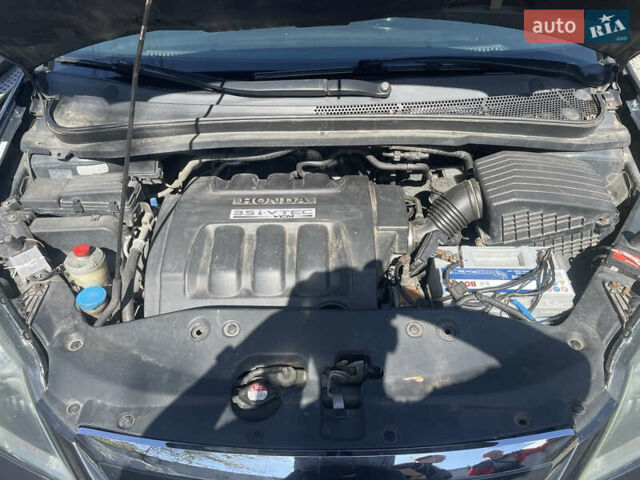 Серый Хонда Одиссей, объемом двигателя 3.5 л и пробегом 300 тыс. км за 6499 $, фото 9 на Automoto.ua