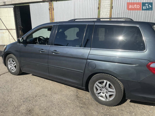 Серый Хонда Одиссей, объемом двигателя 3.5 л и пробегом 300 тыс. км за 6499 $, фото 3 на Automoto.ua