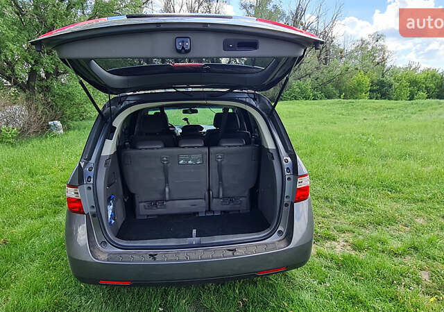 Серый Хонда Одиссей, объемом двигателя 3.47 л и пробегом 301 тыс. км за 11850 $, фото 25 на Automoto.ua