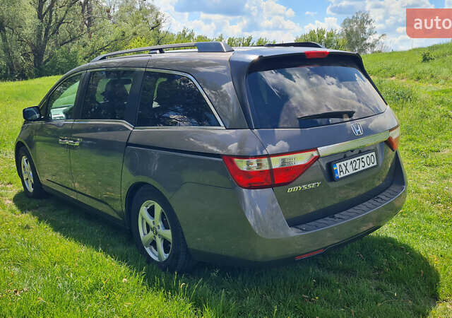 Серый Хонда Одиссей, объемом двигателя 3.47 л и пробегом 301 тыс. км за 11850 $, фото 4 на Automoto.ua