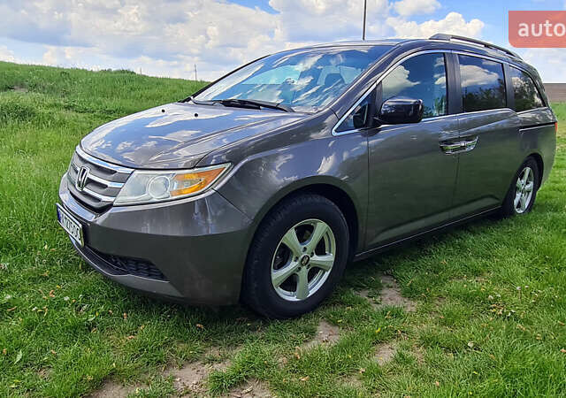 Серый Хонда Одиссей, объемом двигателя 3.47 л и пробегом 301 тыс. км за 11850 $, фото 29 на Automoto.ua