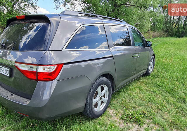 Серый Хонда Одиссей, объемом двигателя 3.47 л и пробегом 301 тыс. км за 11850 $, фото 26 на Automoto.ua