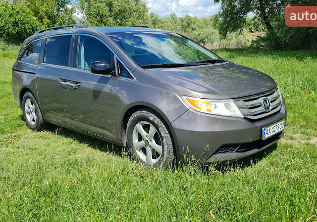 Серый Хонда Одиссей, объемом двигателя 3.47 л и пробегом 301 тыс. км за 11850 $, фото 1 на Automoto.ua