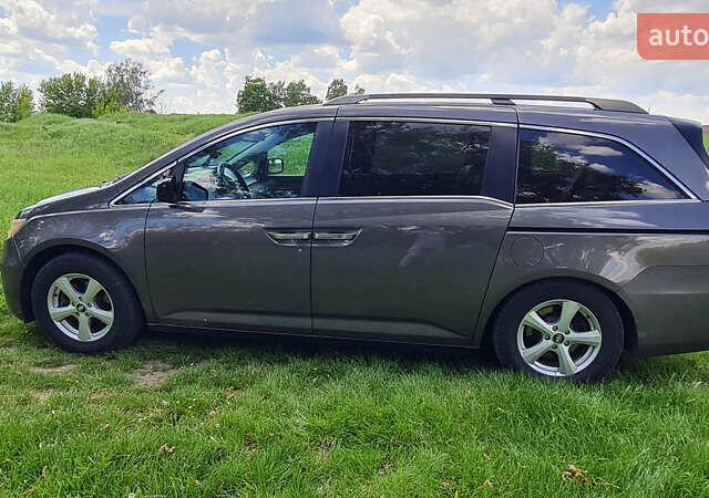 Серый Хонда Одиссей, объемом двигателя 3.47 л и пробегом 301 тыс. км за 11850 $, фото 28 на Automoto.ua