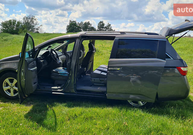 Серый Хонда Одиссей, объемом двигателя 3.47 л и пробегом 301 тыс. км за 11850 $, фото 9 на Automoto.ua