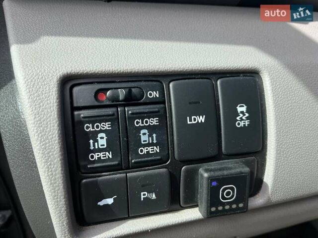 Хонда Одиссей 2013 в Киеве на Automoto.ua Серый Хонда Одиссей, объемом двигателя 3.47 л и пробегом 270 тыс. км за 16500 $, фото 12 на Automoto.ua