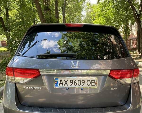 Серый Хонда Одиссей, объемом двигателя 3.47 л и пробегом 100 тыс. км за 13600 $, фото 2 на Automoto.ua