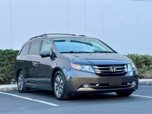 Серый Хонда Одиссей, объемом двигателя 3.5 л и пробегом 80 тыс. км за 14500 $, фото 2 на Automoto.ua