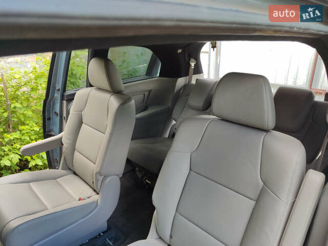 Синий Хонда Одиссей, объемом двигателя 3.47 л и пробегом 335 тыс. км за 15700 $, фото 10 на Automoto.ua