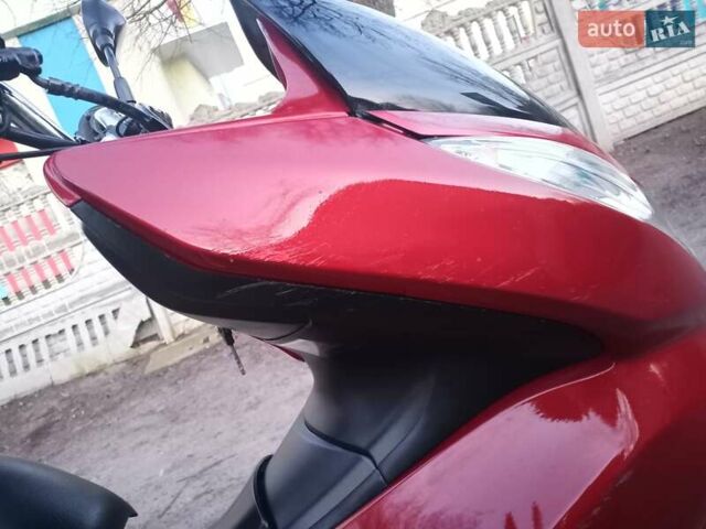 Красный Хонда PCX 125, объемом двигателя 0.13 л и пробегом 13 тыс. км за 1200 $, фото 9 на Automoto.ua