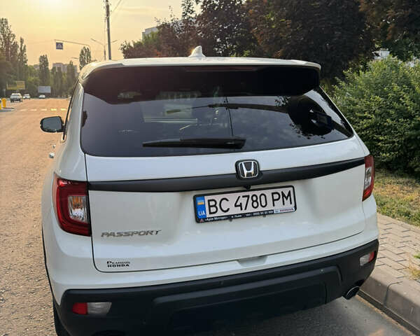 Белый Хонда Пасспорт, объемом двигателя 3.47 л и пробегом 66 тыс. км за 22500 $, фото 14 на Automoto.ua